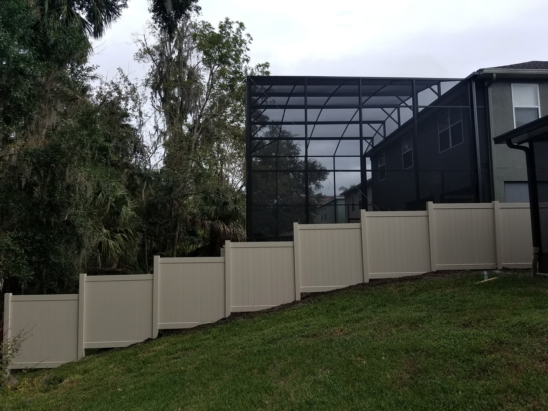 white color vinyl fencing in lawn