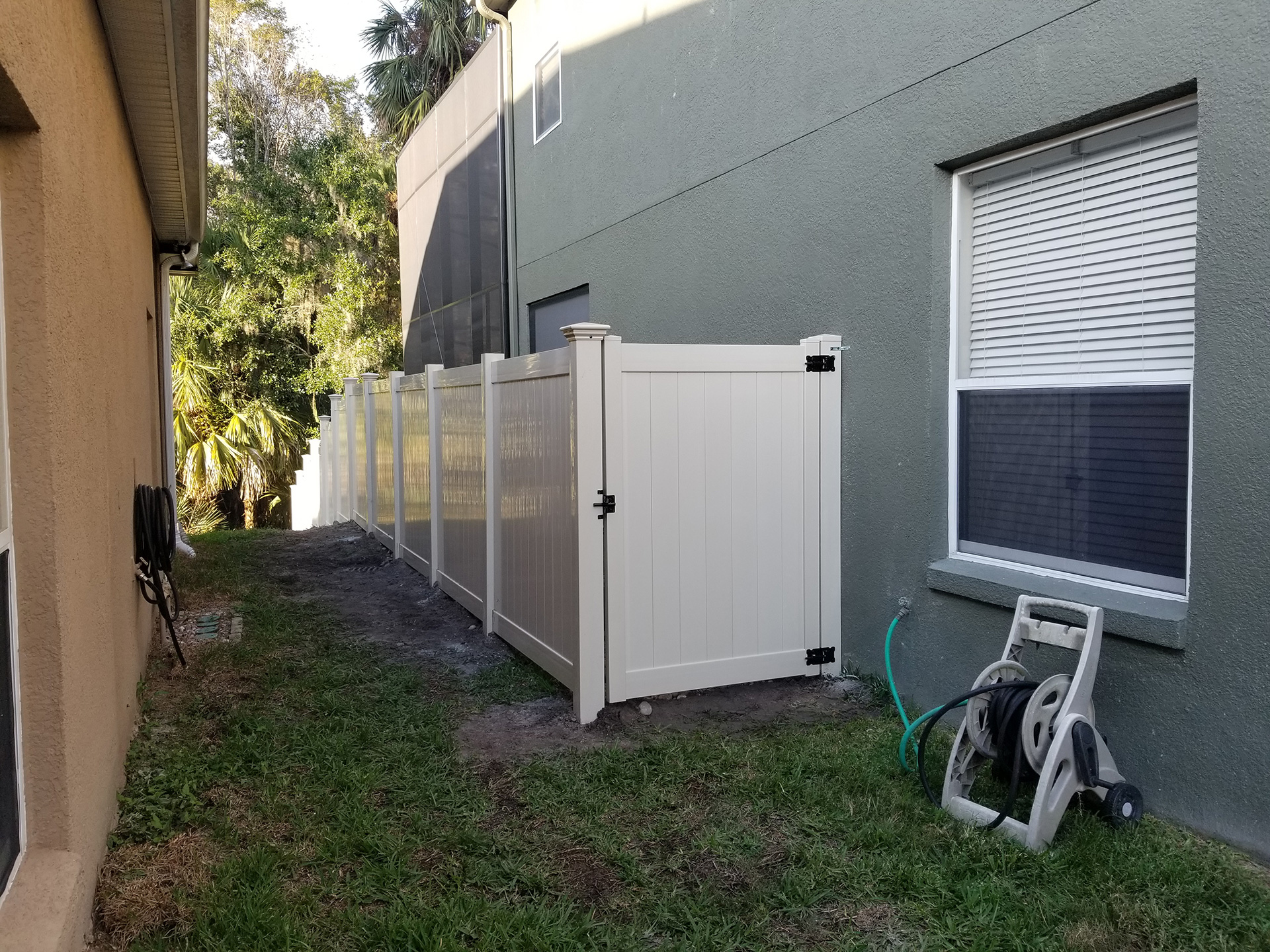 6'-HIGH-TAN-VINYL-T&G-PRIVACY--(3) white vinyl fence