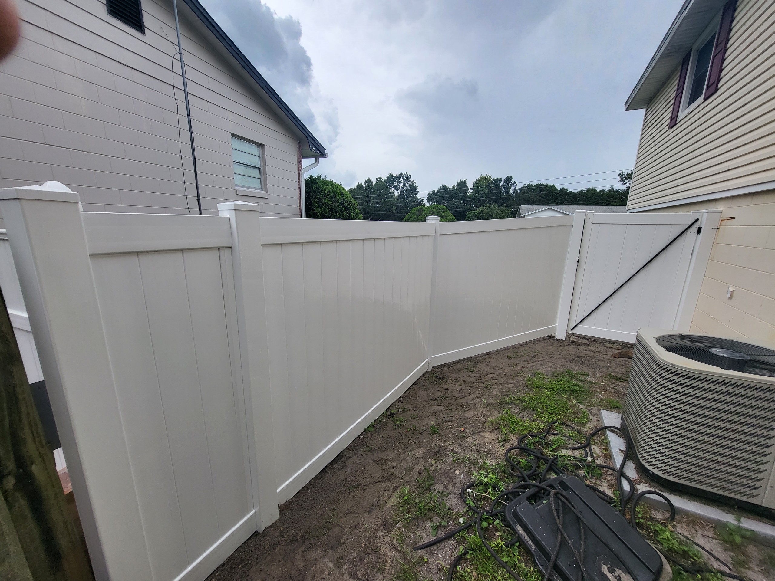 Vinyl fence outside house