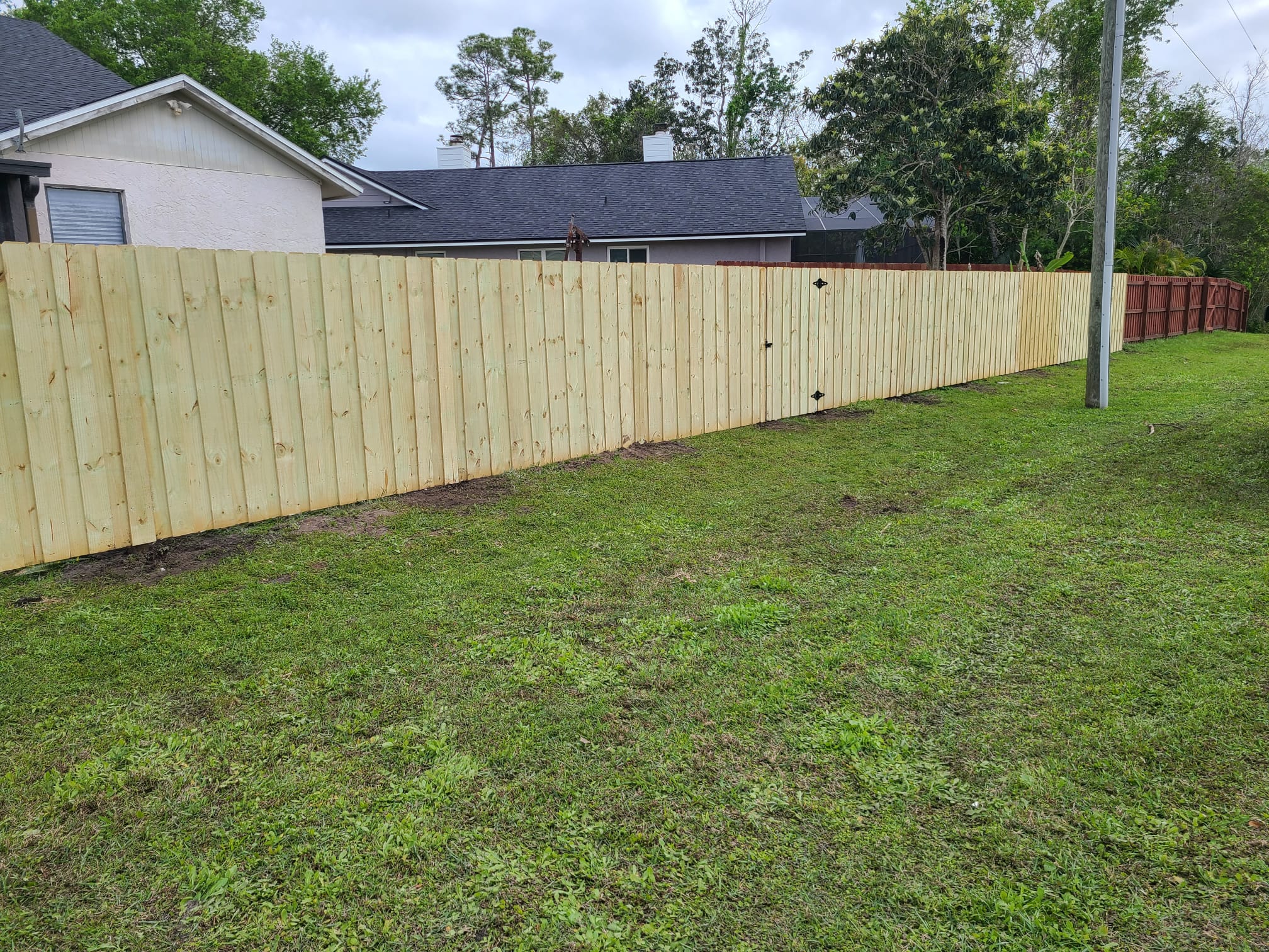 wood fencing in ground